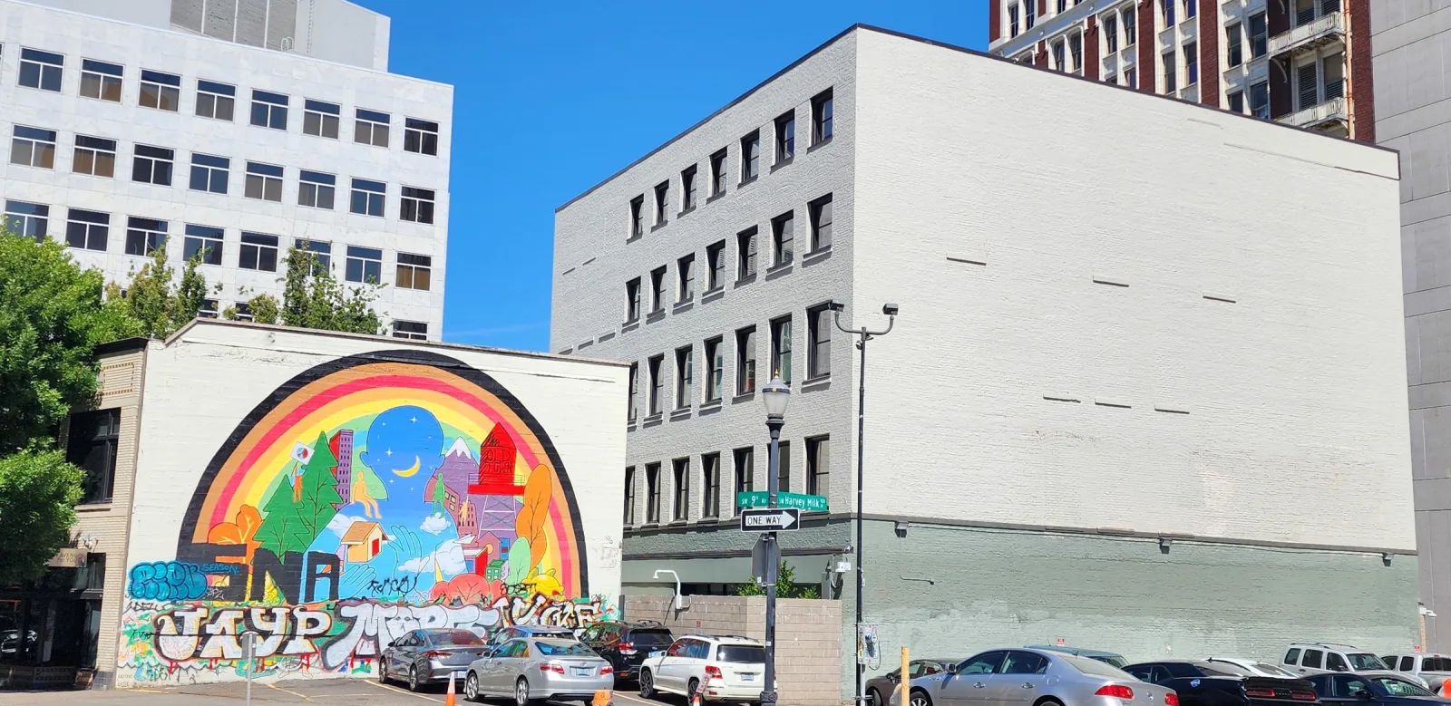Rainbow mural on a wall beside the Behavioral Health Resource Center
