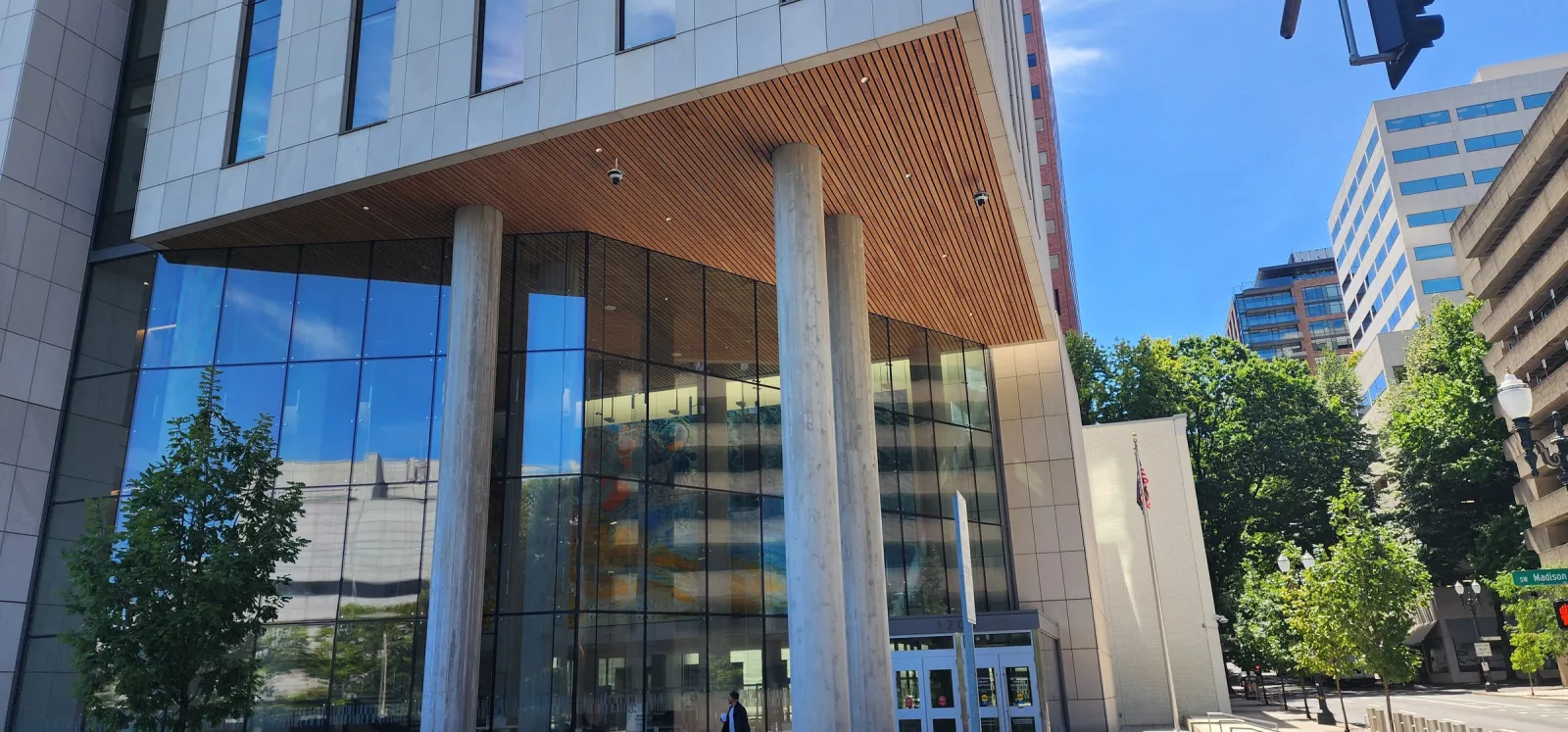 Central Courthouse entrance under its wood-lined canopy