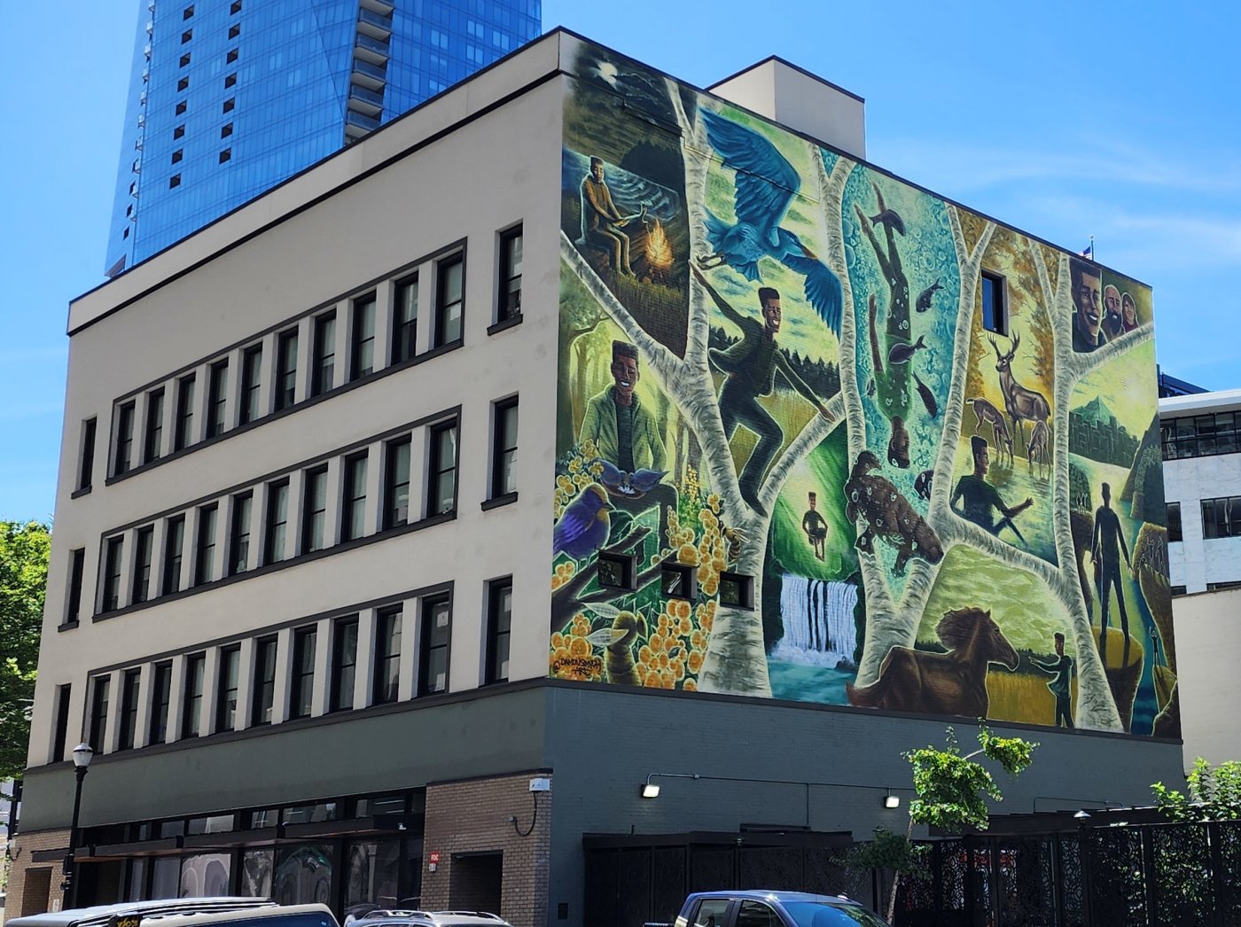 Behavioral Health Resource Center with a large nature mural across its side wall